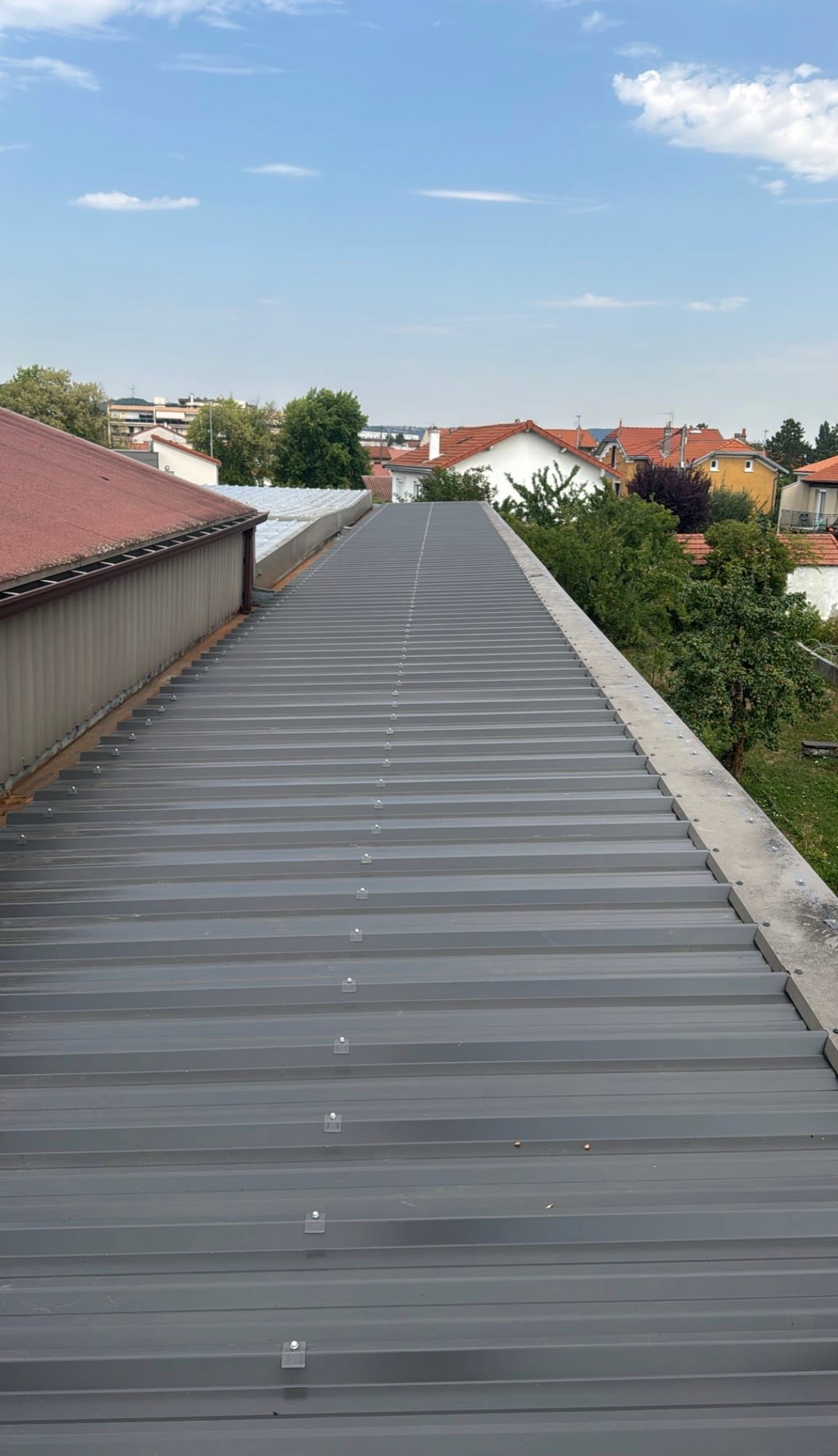 Couverture en zinc à joint debout, chantier mené par Toiture Charpente